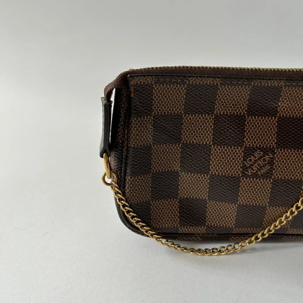 LOUIS VUITTON DAMIER EBENE MINI POCHETTE ACCESSOIRES